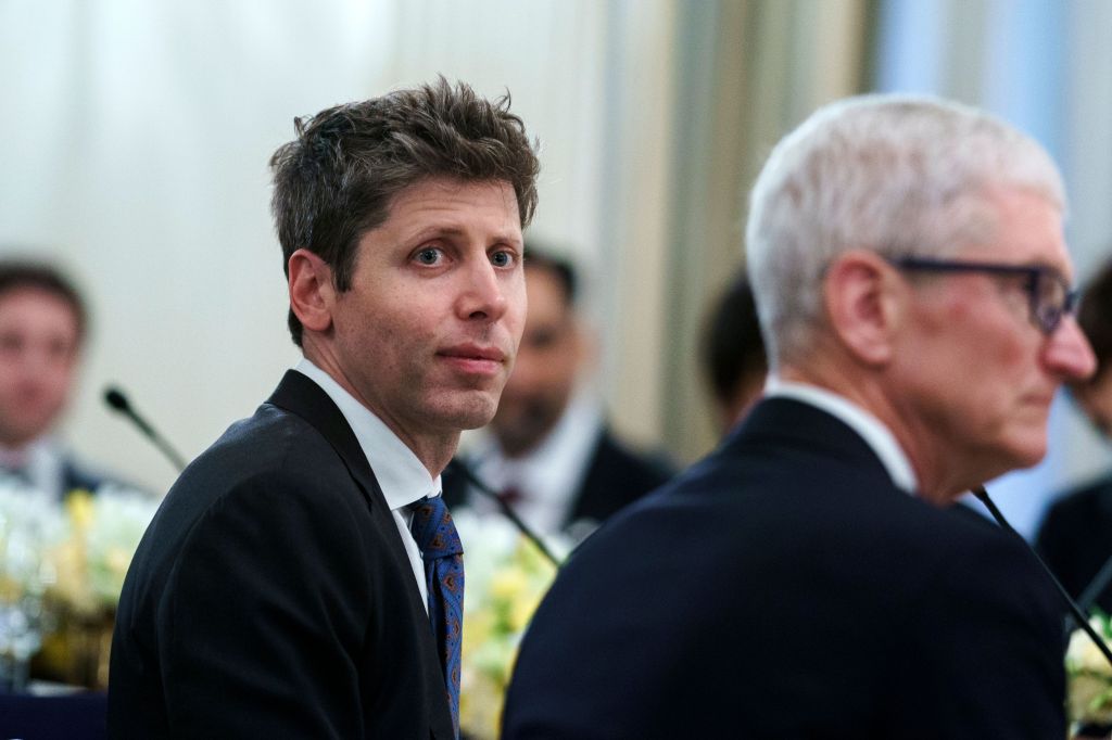 Sam Altman at a White House dinner with tech leaders.