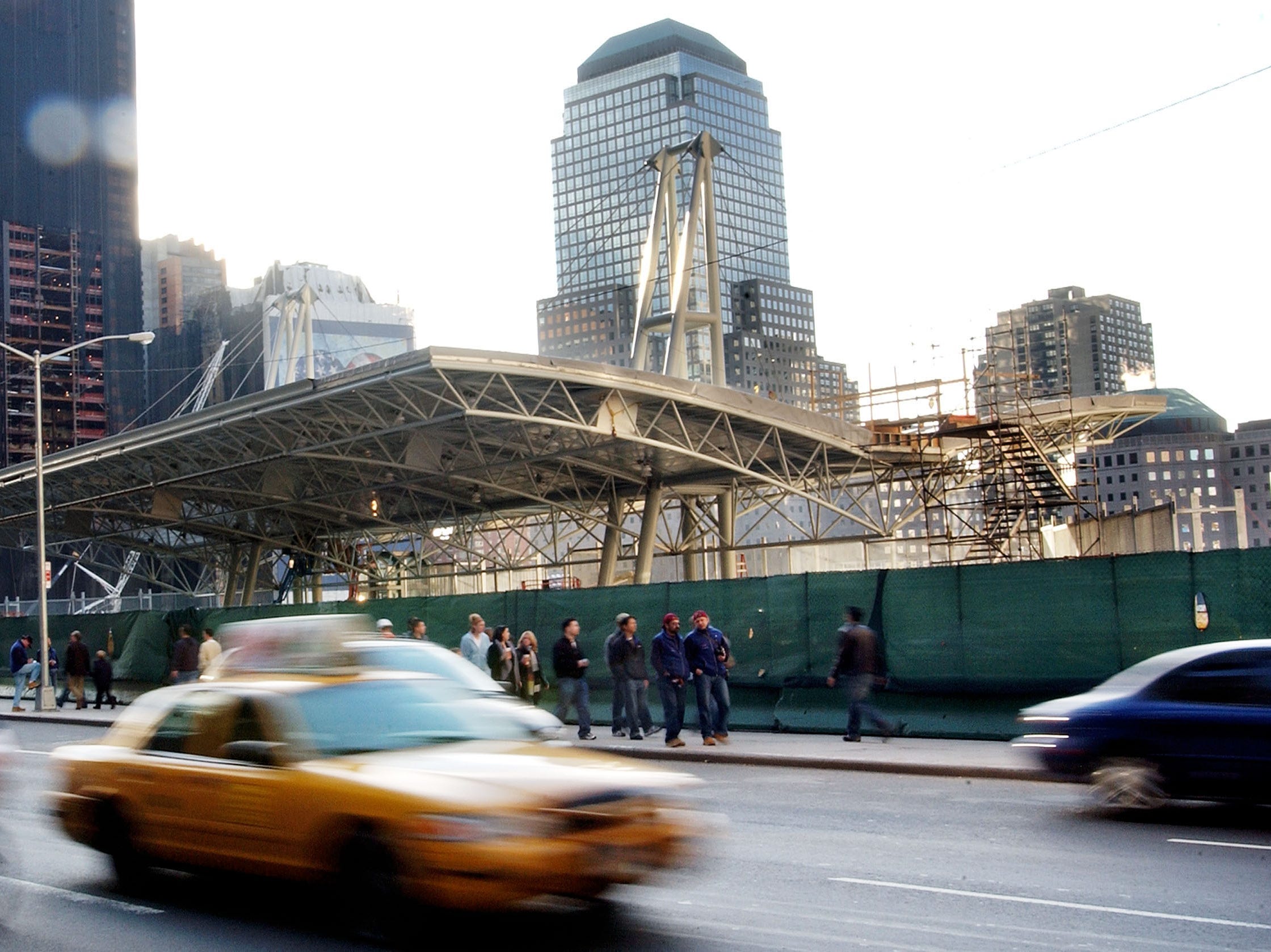 A taxi drives past the construction in the Financial District in 2003.