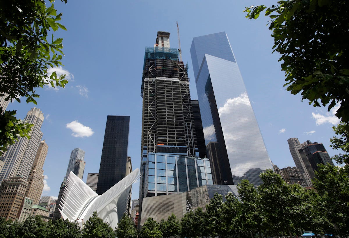 One World Trade Center towers over the lower Manhattan skyline, Tuesday, Aug. 2, 2011 in New York. The skyscraper is now 76 floors and will reach 104 floors.