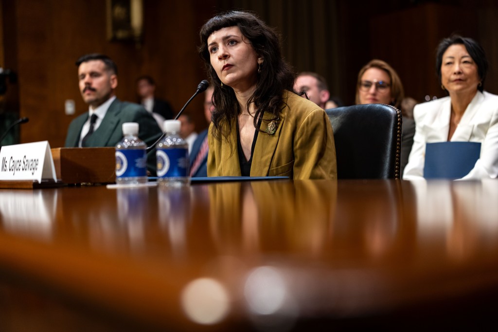 Cayce Savage testifying at a Senate hearing.