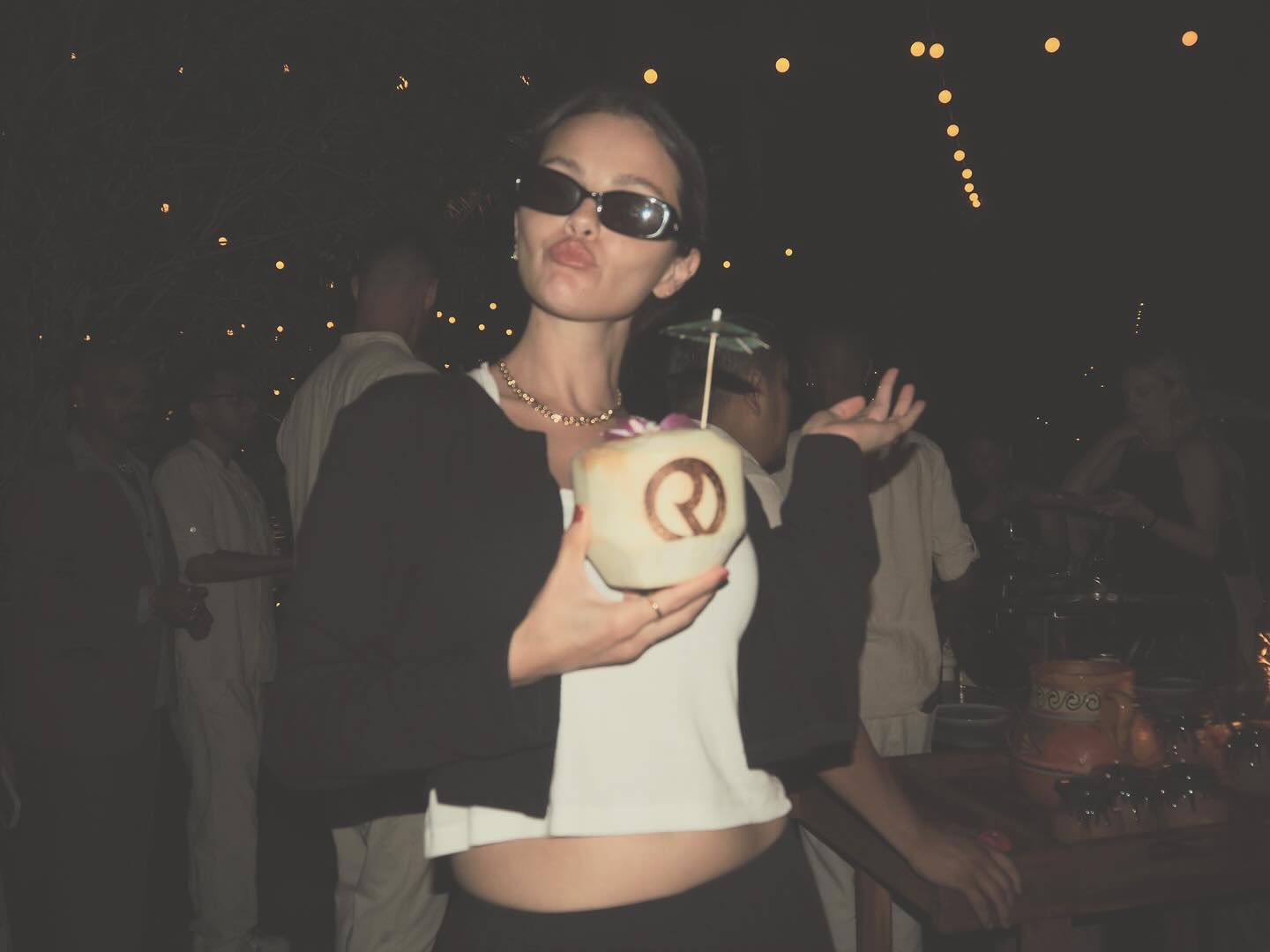 Selena Gomez celebrates 5 years of Rare beauty with a coconut drink.