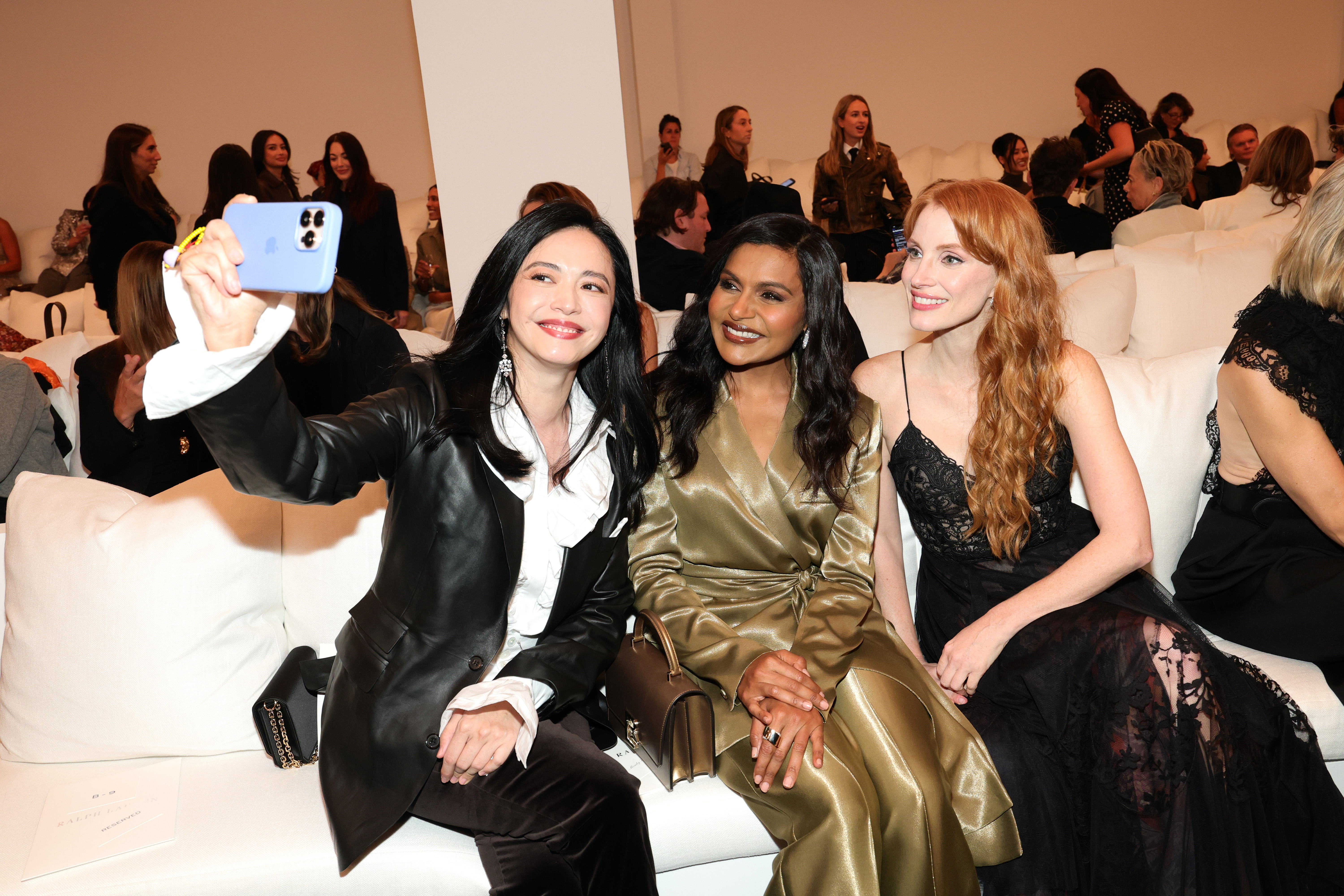 Yao Chen, Mindy Kaling and Jessica Chastain  beam for a selfie while attending the Ralph Lauren show in NYC.