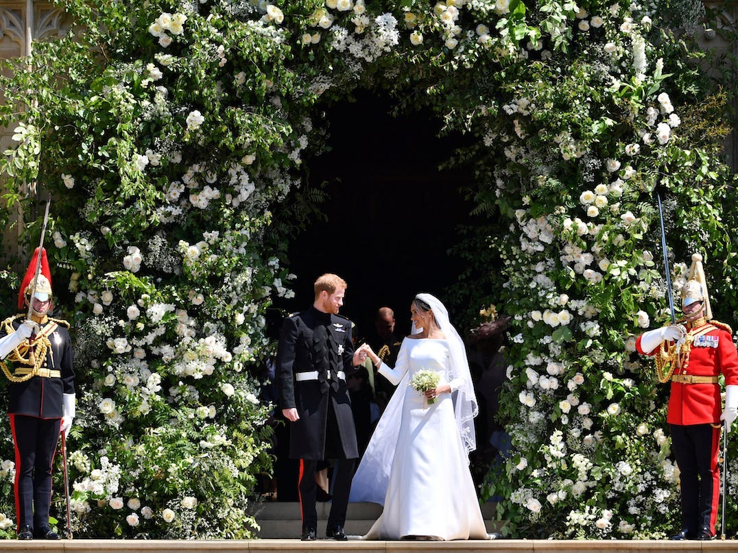 Prince Harry and Meghan Markle leave after their wedding ceremony at St. George's Chapel in Windsor Castle in Windsor, near London, England, Saturday, May 19, 2018.