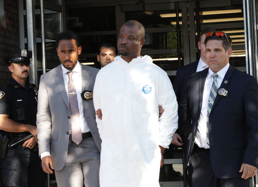 Suspect Jamel McGriff escorted from a police precinct.