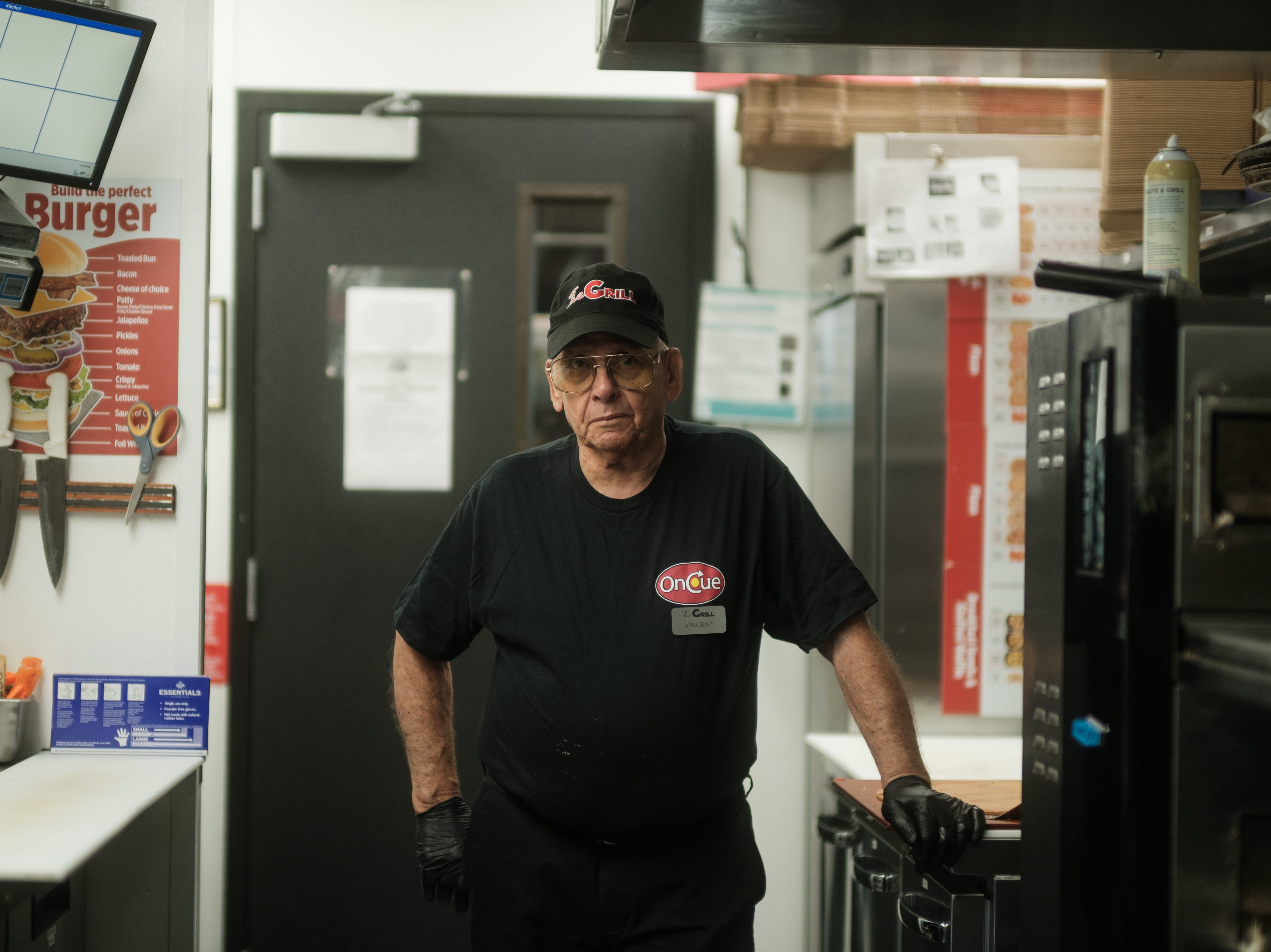Vince Scidone mans the grill at an OnCue location outside Oklahoma City.