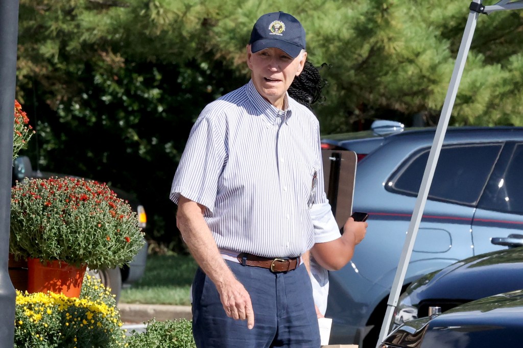 Joe Biden leaving a grocery store.