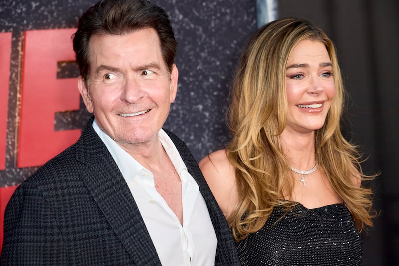 HOLLYWOOD, CALIFORNIA - SEPTEMBER 04: (L-R) Charlie Sheen and Denise Richards attend the Los Angeles Premiere Of Netflix's
