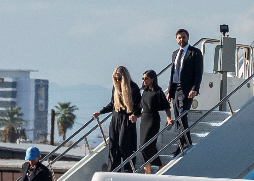 U.S. Vice President JD Vance, his wife Usha Vance and wife of slain conservative activist Charlie Kirk, Erika Frantzve, exit Air Force Two, which is carrying the body of Kirk, as the aircraft lands at the airport in Phoenix, Arizona, U.S., September 11, 2025, one day after Kirk was fatally shot during an event at Utah Valley University. REUTERS/Thomas Machowicz