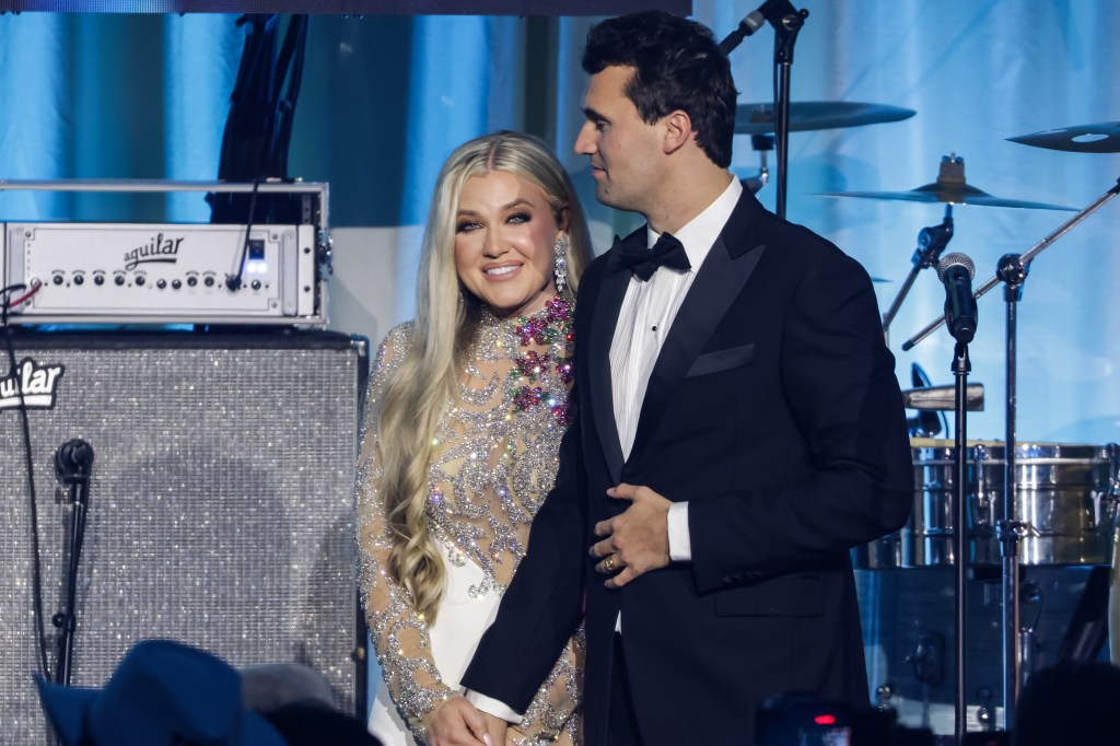 WASHINGTON, DC - JANUARY 19: Charlie Kirk (R) and and his wife Erika Lane Frantzve (L) on stage during the Turning Point USA Inaugural-Eve Ball at the Salamander Hotel on January 19, 2025 in Washington, DC. (Photo by Samuel Corum/Getty Images)
