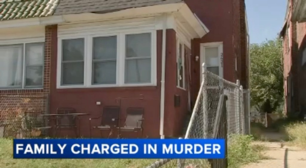 Exterior of a red brick house where a family was charged with murder.