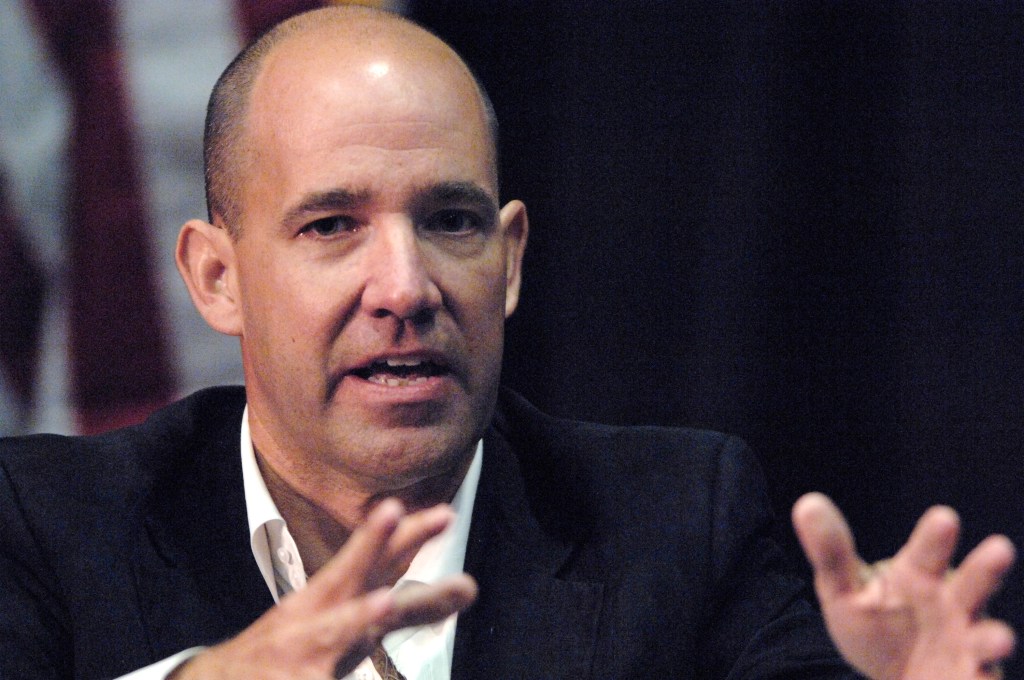 Matthew Dowd speaking at a political conference.