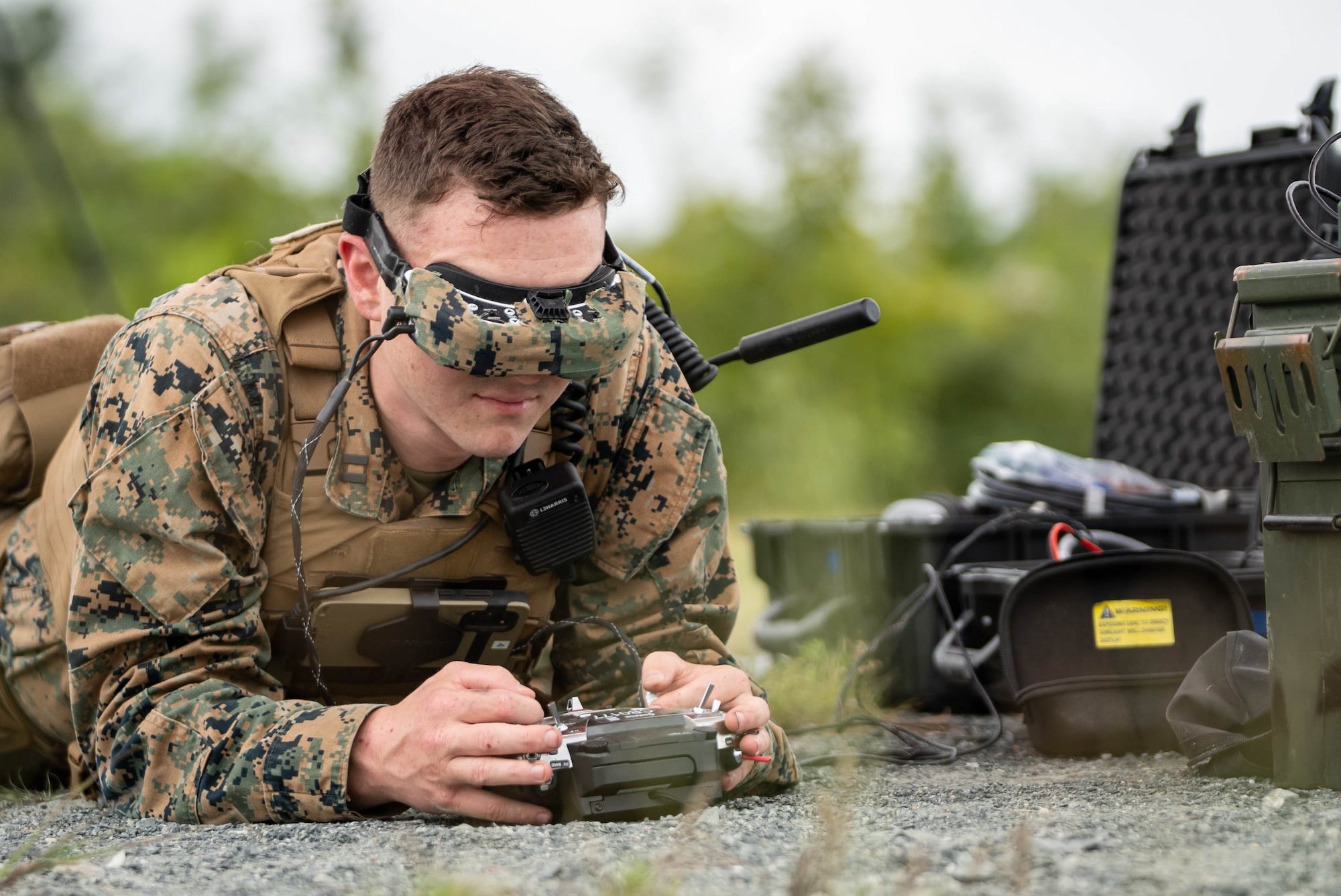 A Marine with the Corps' Attack Drone Team controlled an aerial vehicle during an August demonstration in Quantico, Va.