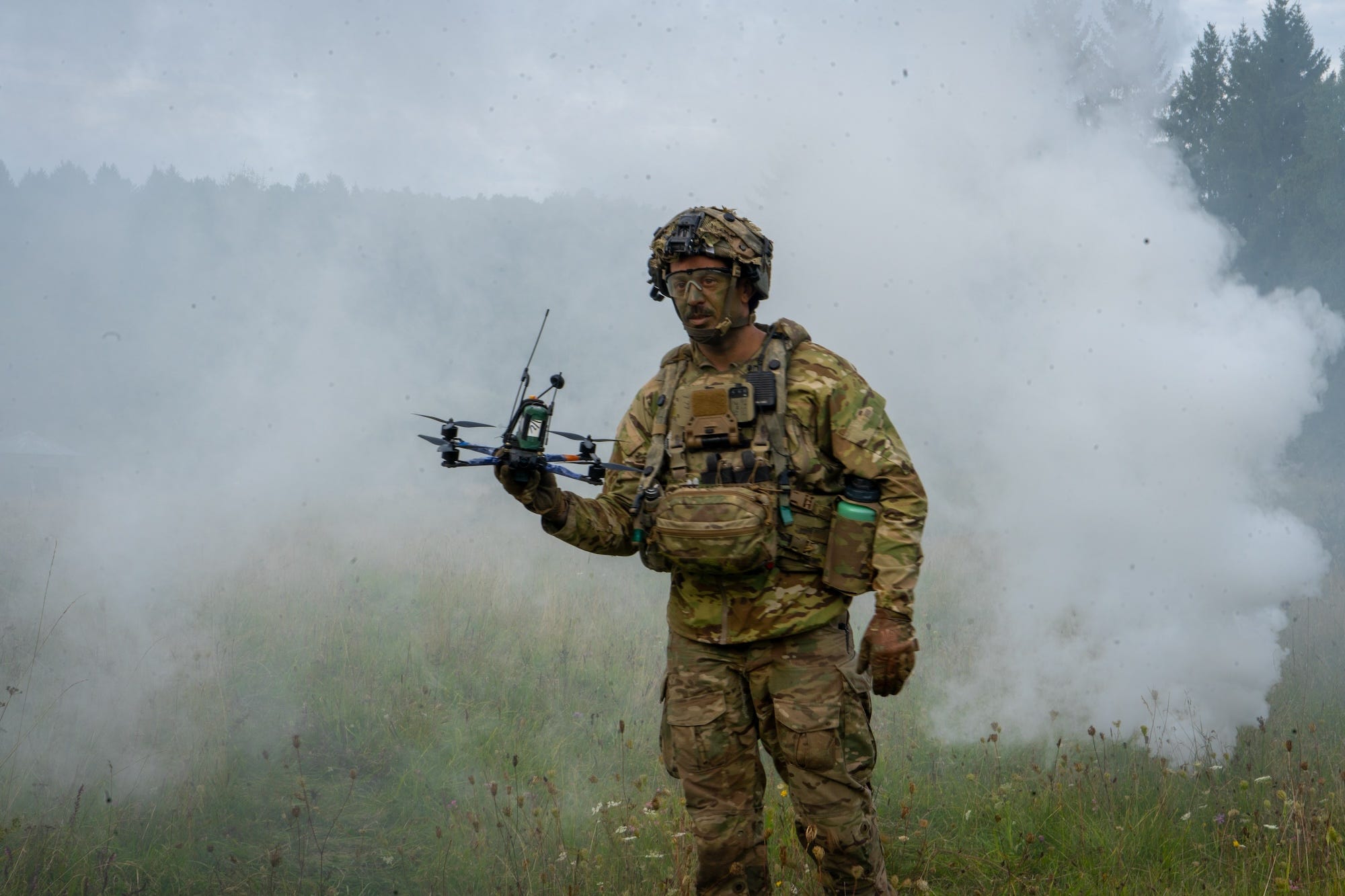 A US soldier prepared to launch a small reconnaissance drone during a September exercise in Germany.