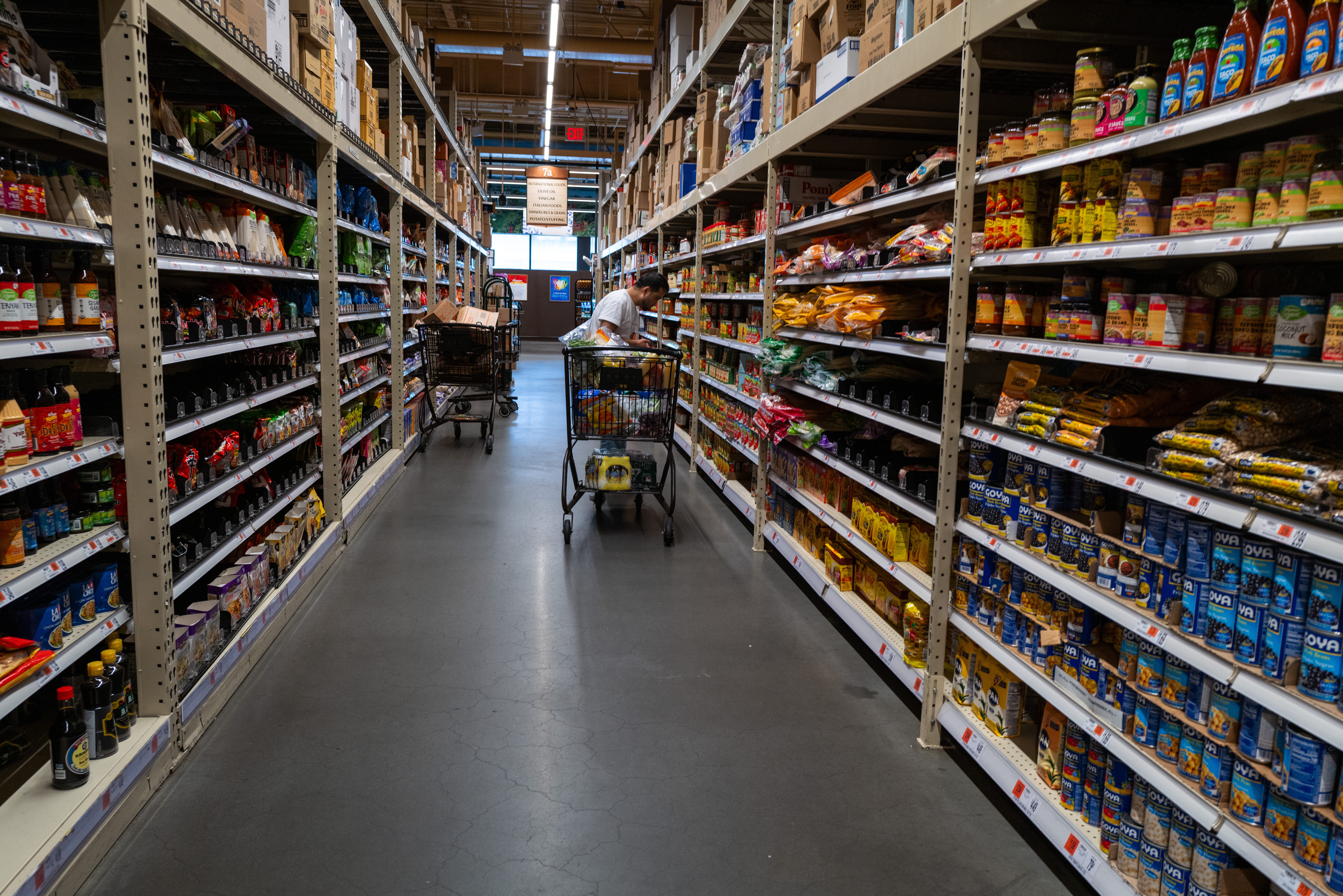 grocery store aisles lined with food