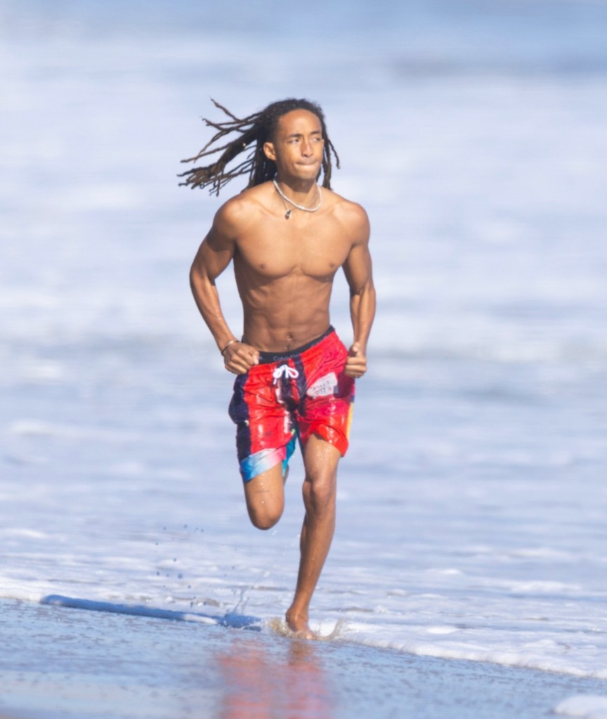 Jaden Smith channels his inner “Baywatch” hunk while running on the beach in Malibu, Calif.
