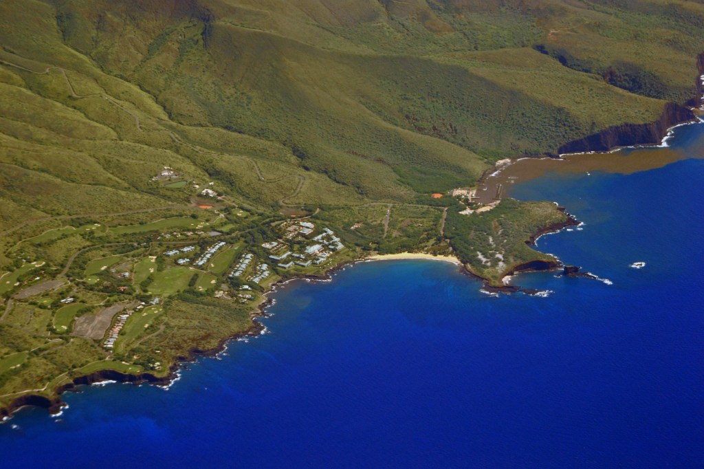 Aerial view of Hulopoe Beach and Sweetheart Rock, Lanai Island, Hawaii.