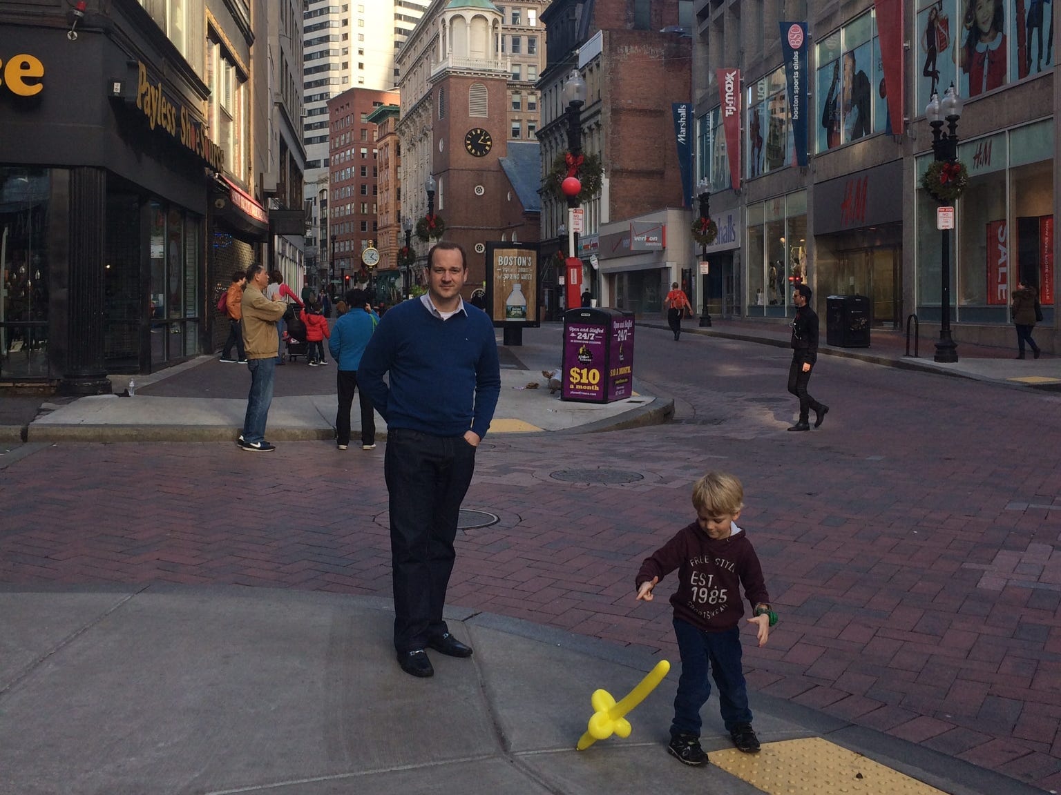 The author's husband and son pose in the streets of Boston in 2015.