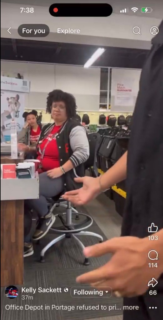 screenshot of viral video showing Michigan Office Depot employee refusing to print Charlie Kirk photos