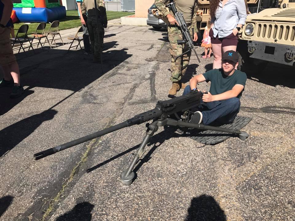 Tyler Robinson with playing with a machine gun. 