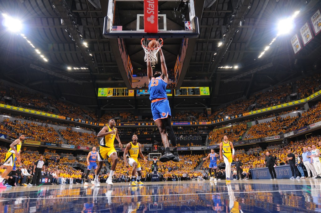 Mitchell Robinson of the New York Knicks dunking during Game Six of the Eastern Conference Finals.
