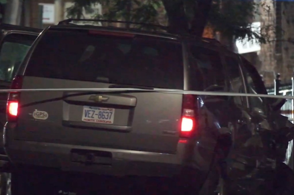 Rear view of a silver SUV involved in a fatal accident.