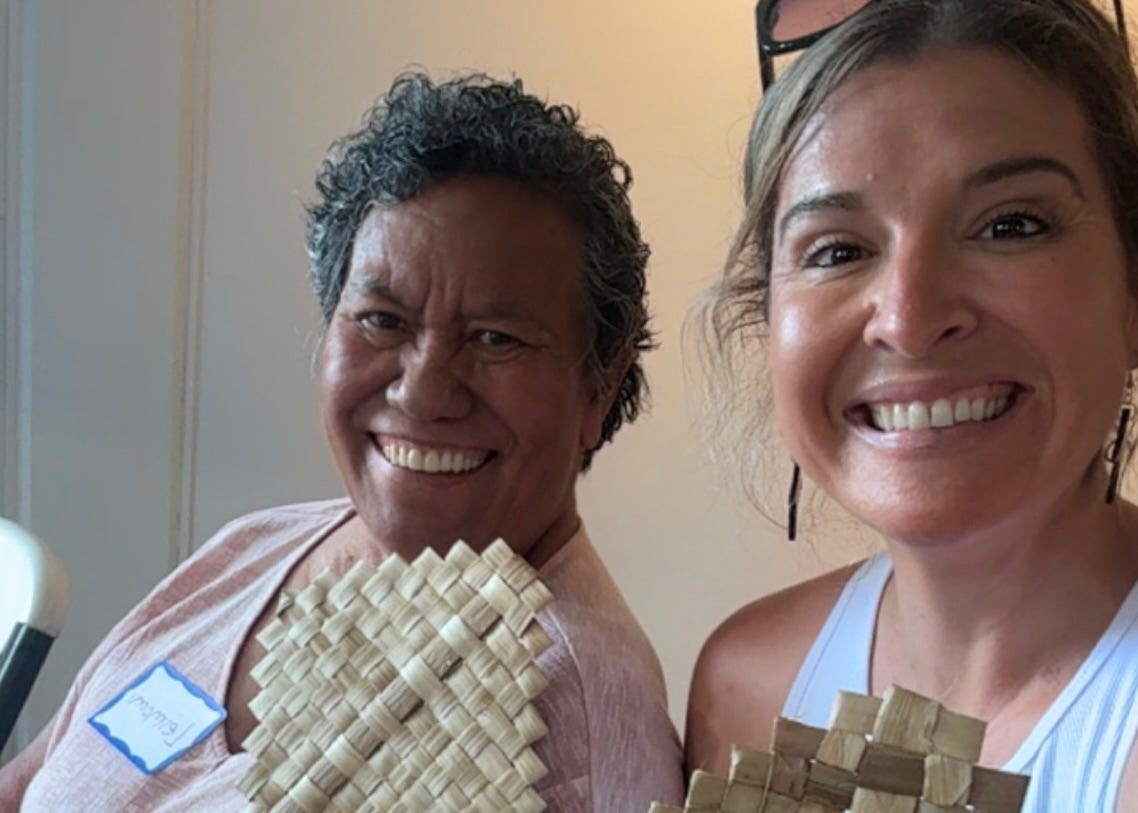 Woman and mother-in-law posing for photo
