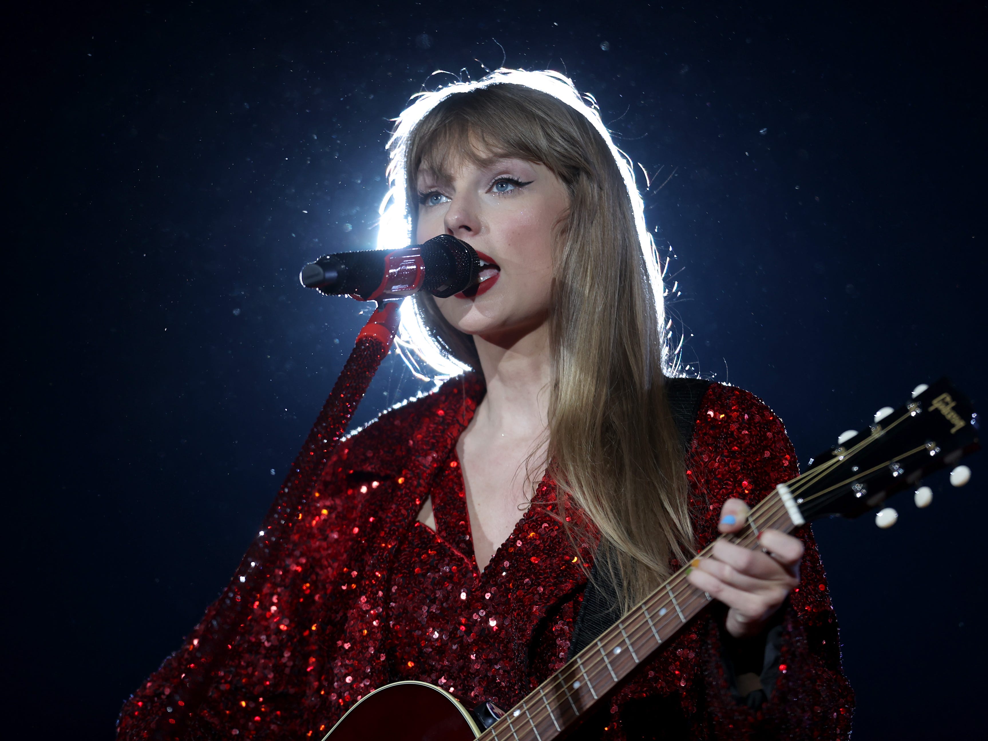Taylor Swift performs during the Eras Tour in Arlington, Texas.
