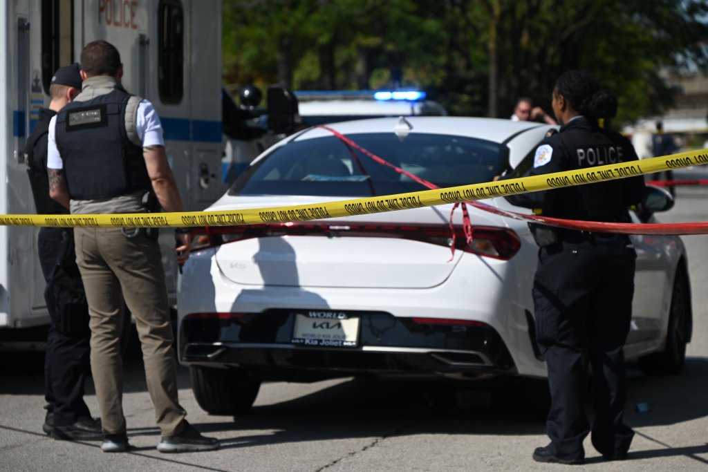 Police officers at a crime scene.