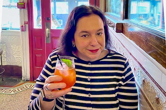 Woman holding a drink