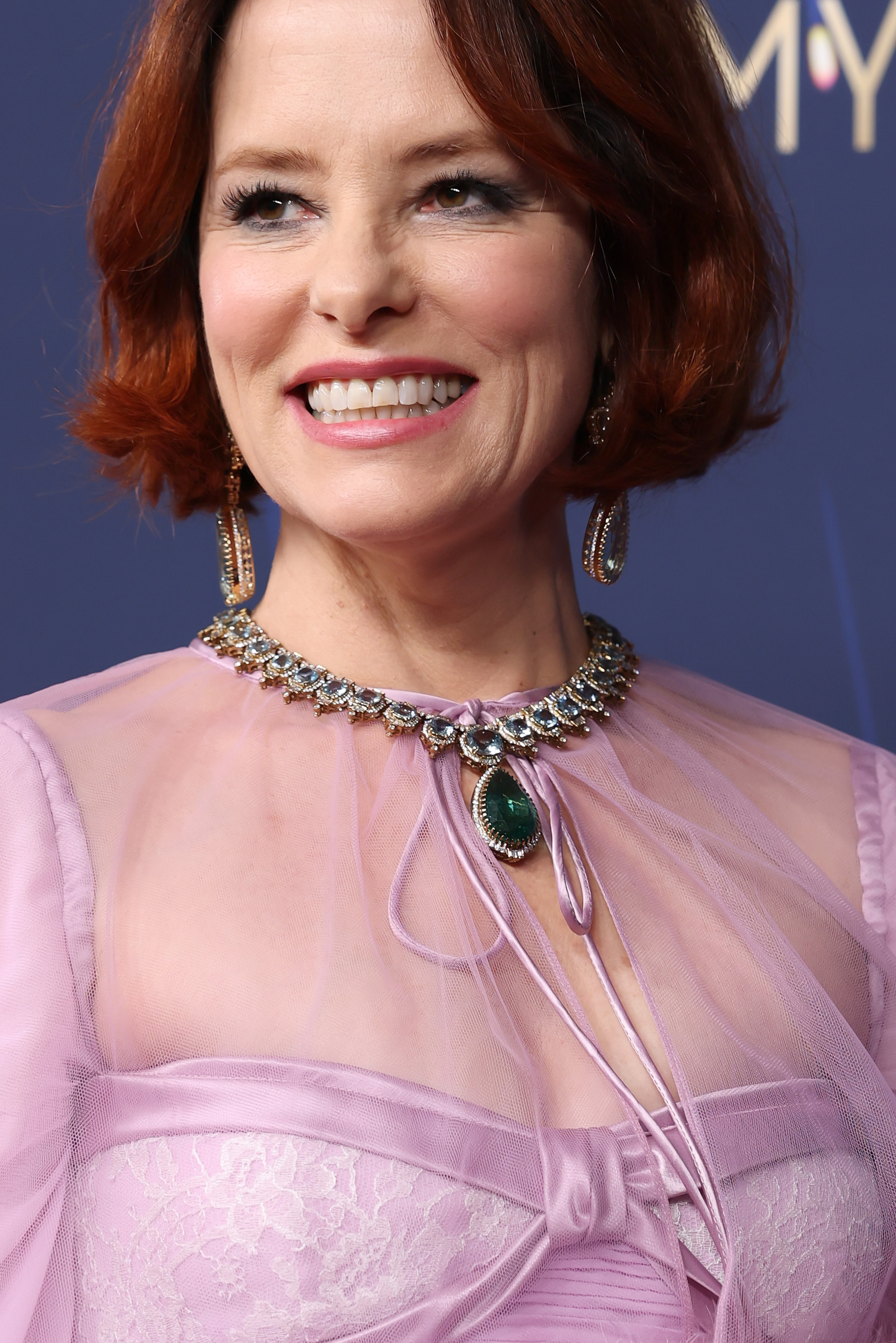 Parker Posey's emerald necklace