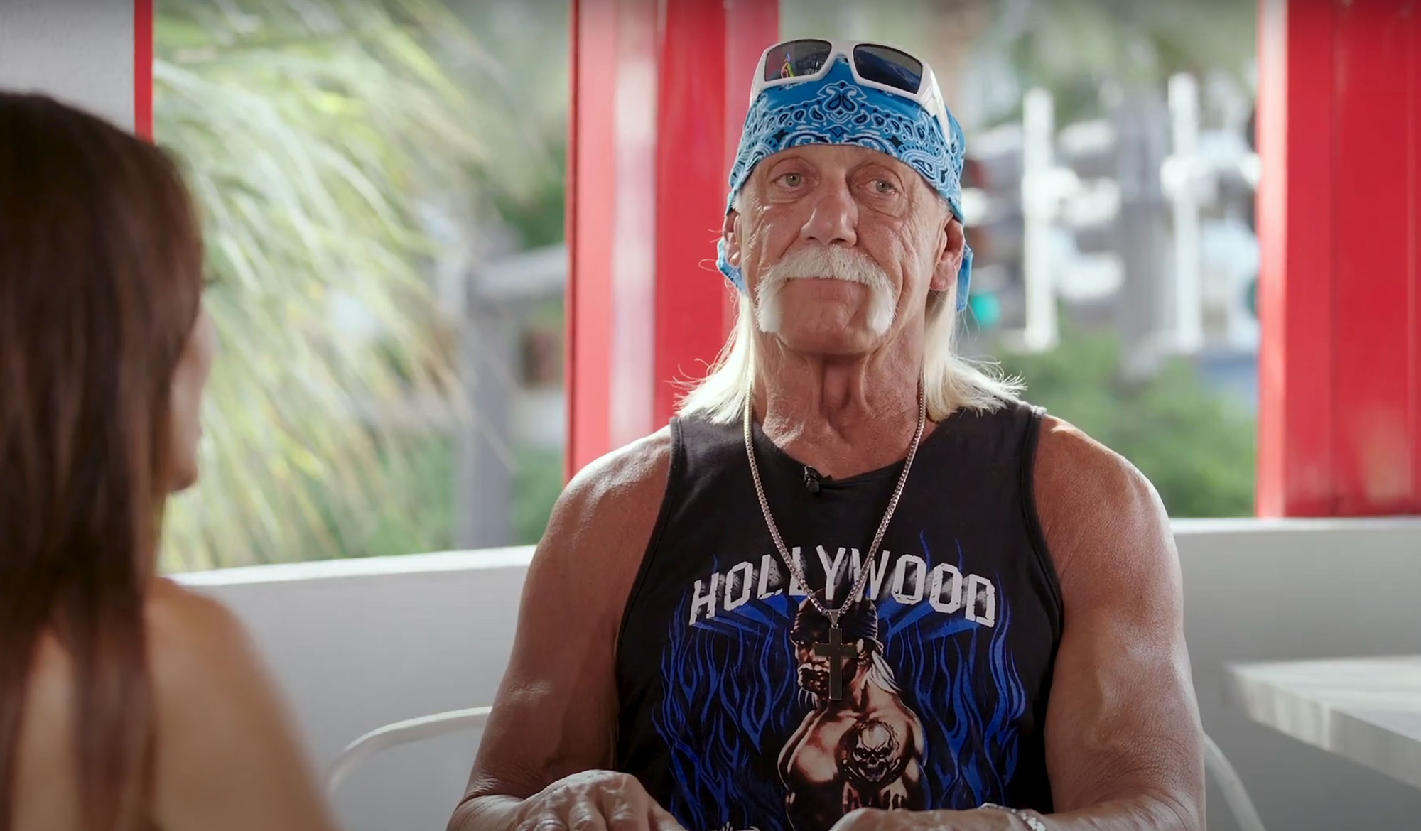 Hulk Hogan in a graphic tank top.
