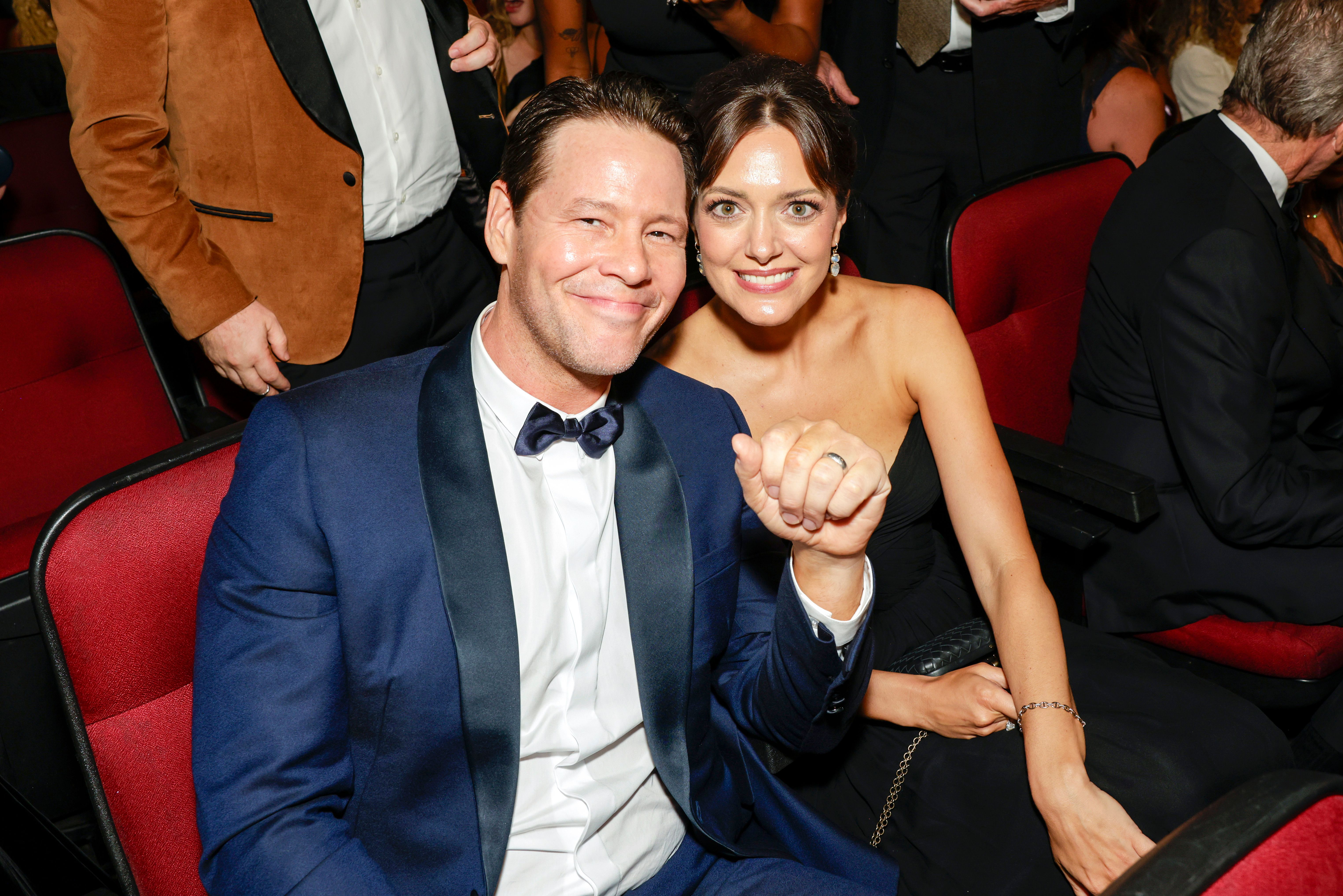 Ike Barinholtz and Erica Hanson attend The 77th Primetime Emmy Awards