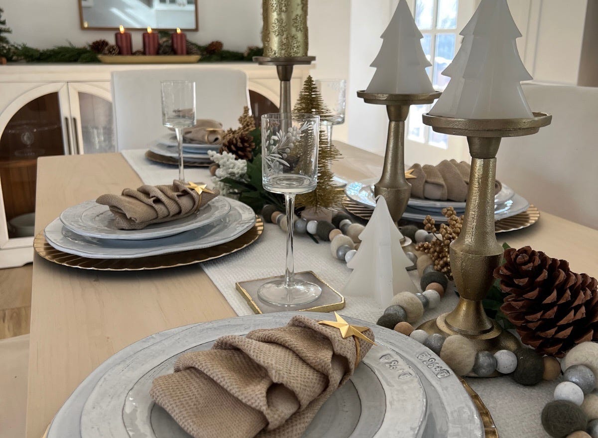 Napkins folded to like like trees on tablescape