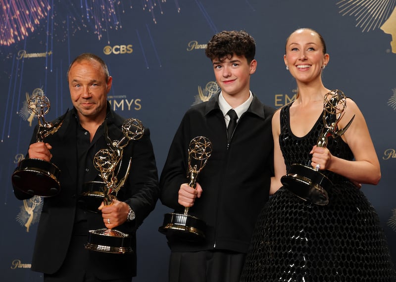 Stephen Graham, winner of Best Lead Actor in a Limited or Anthology Series or Movie and Best Writing for a Limited or Anthology Series or Movie, Owen Cooper, Best Supporting Actor in a Limited or Anthology Series or Movie, and Erin Doherty, Best Supporting Actress in a Limited or Anthology Series or Movie, for "Adolescence", Best Limited or Anthology Series pose with their awards at the 77th Primetime Emmy Awards in Los Angeles, California