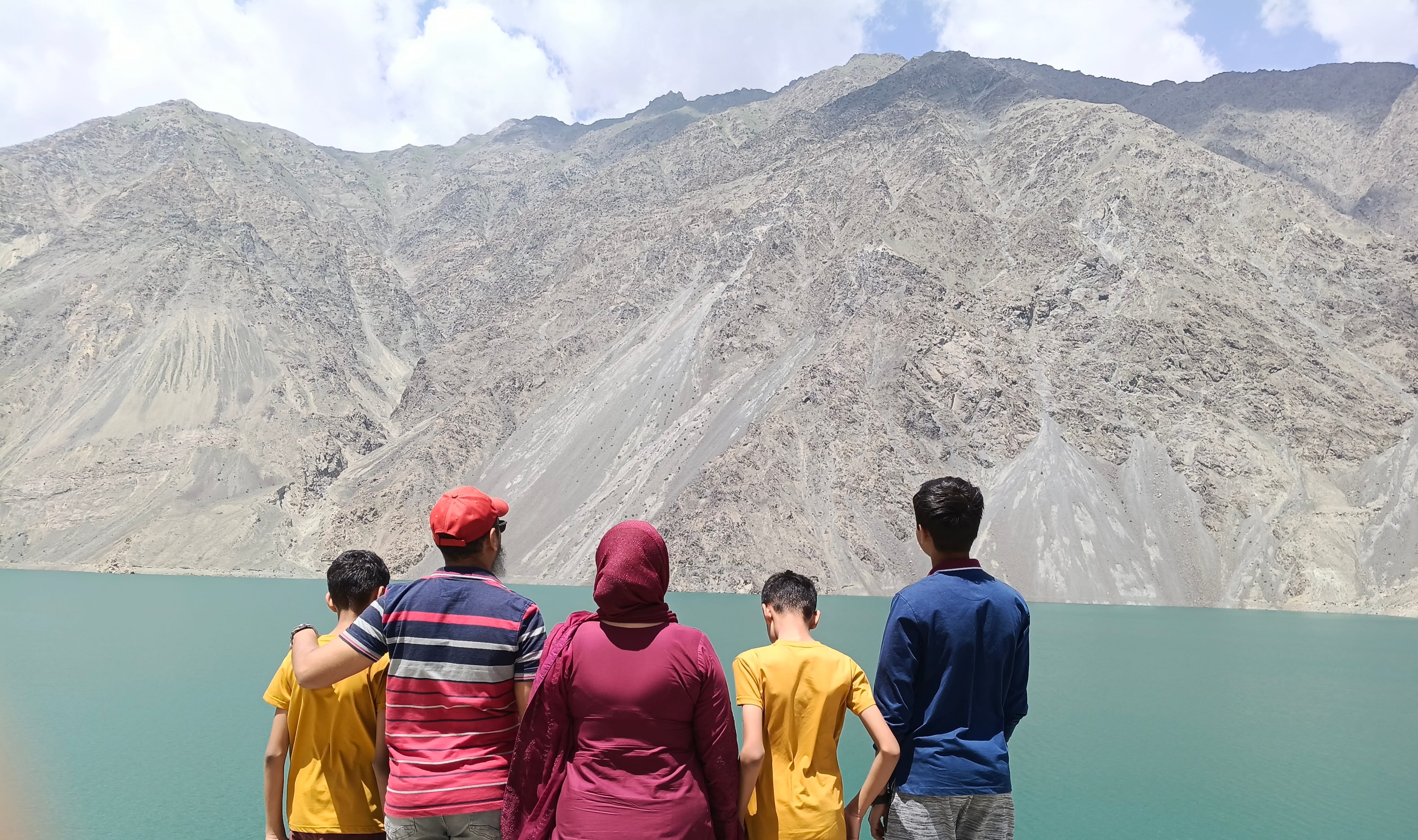The author (center) with her husband and three sons overlooking Satpara Lake in Pakistan.
