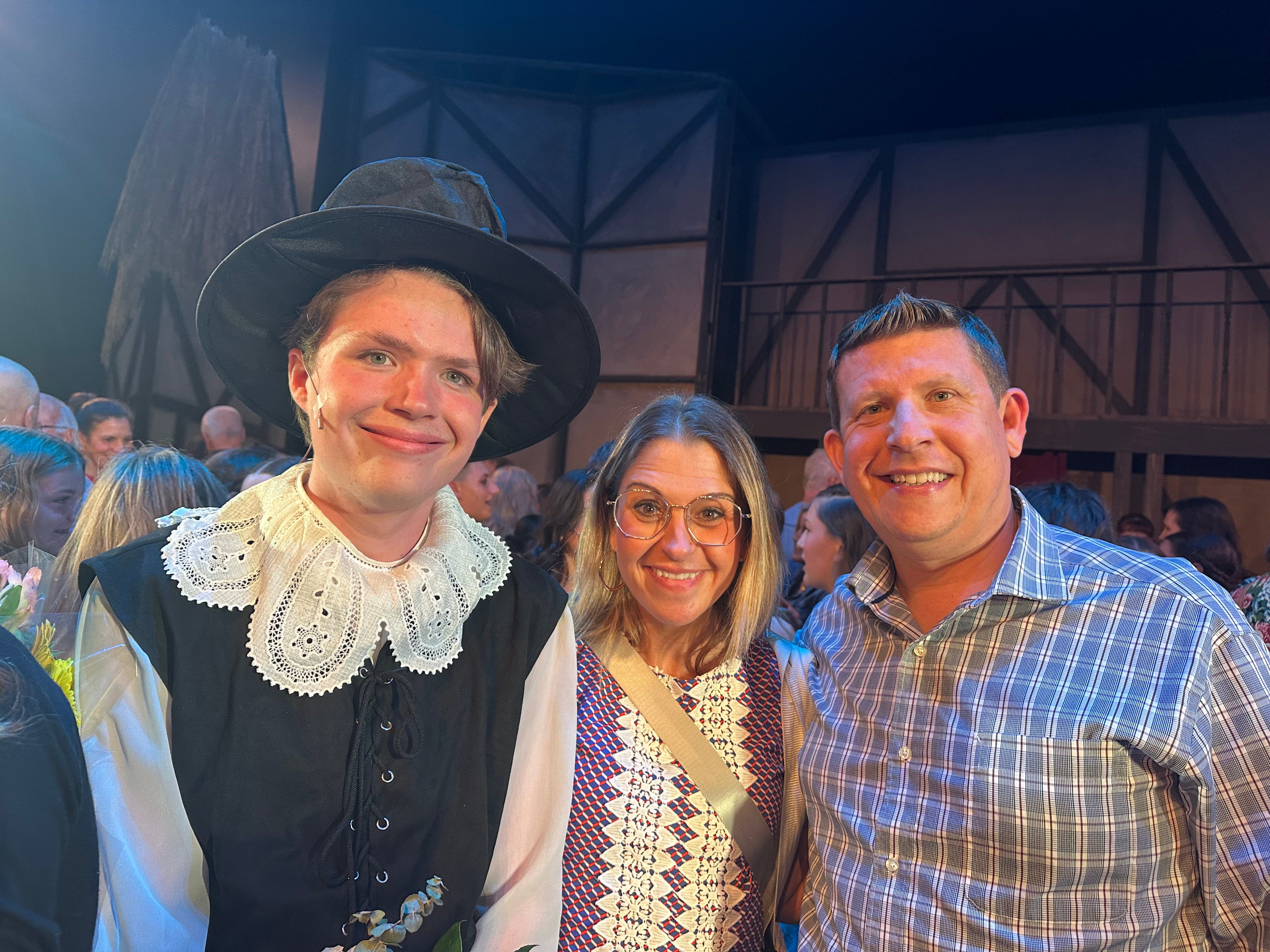 The author with her husband and son at a theater performance,