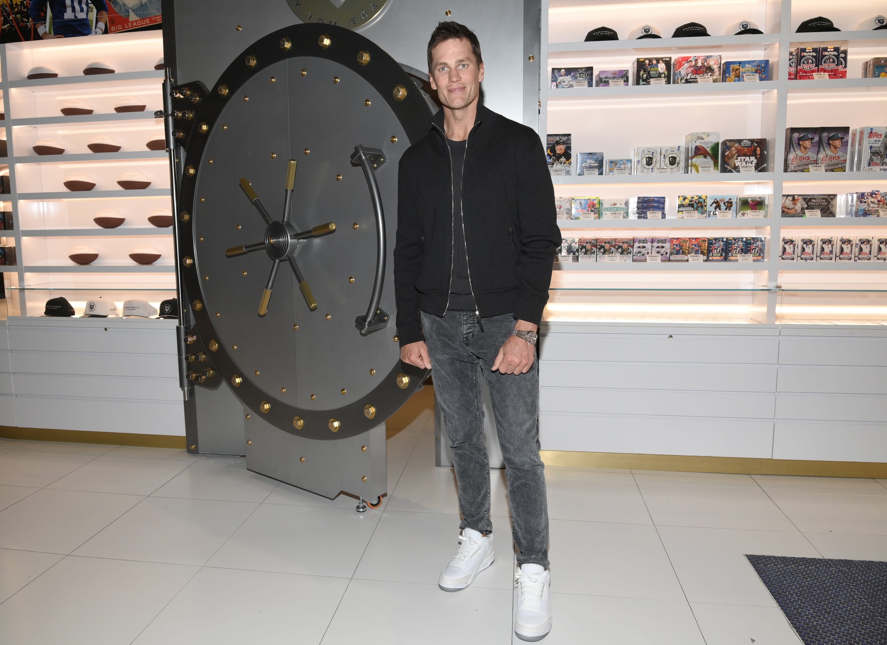 Tom Brady stands inside his card store at the American Dream mall in New Jersey.
