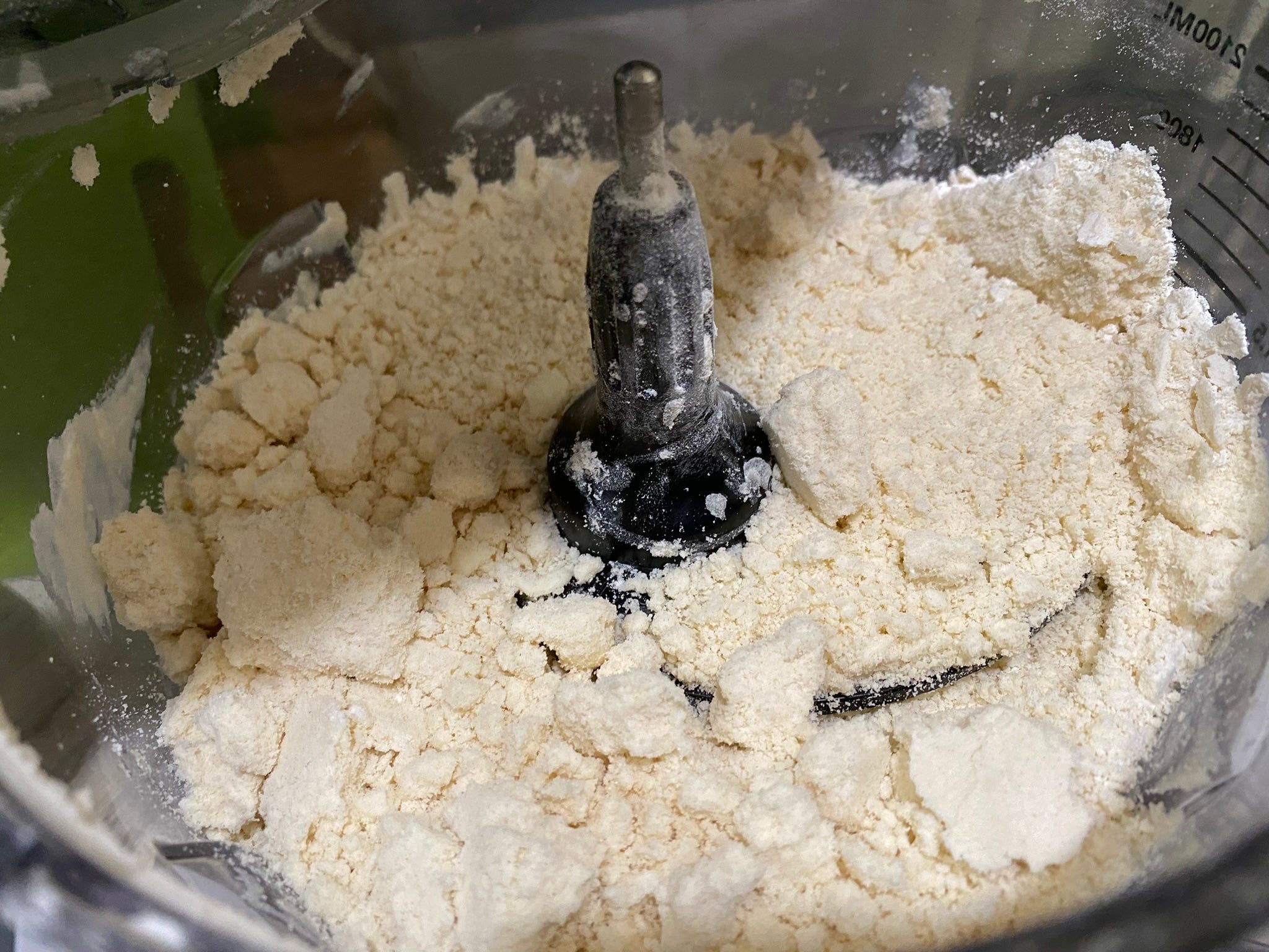 ingredients for pie crust in a food processor
