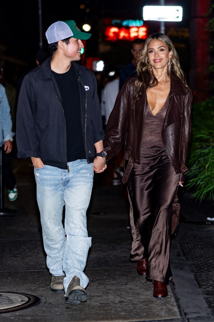 *EXCLUSIVE* New York, NY Jessica Alba enjoyed a rare date night with new boyfriend Danny Ramirez at The Corner Store in New York City, the pair spotted hand-in-hand while joining Marlon Wayans for the evening. Alba stunned in a silky chocolate-brown dress and matching leather jacket, while Ramirez kept it casual in ripped jeans and a cap. Wayans, meanwhile, brought the laughs as he walked alongside the couple.
