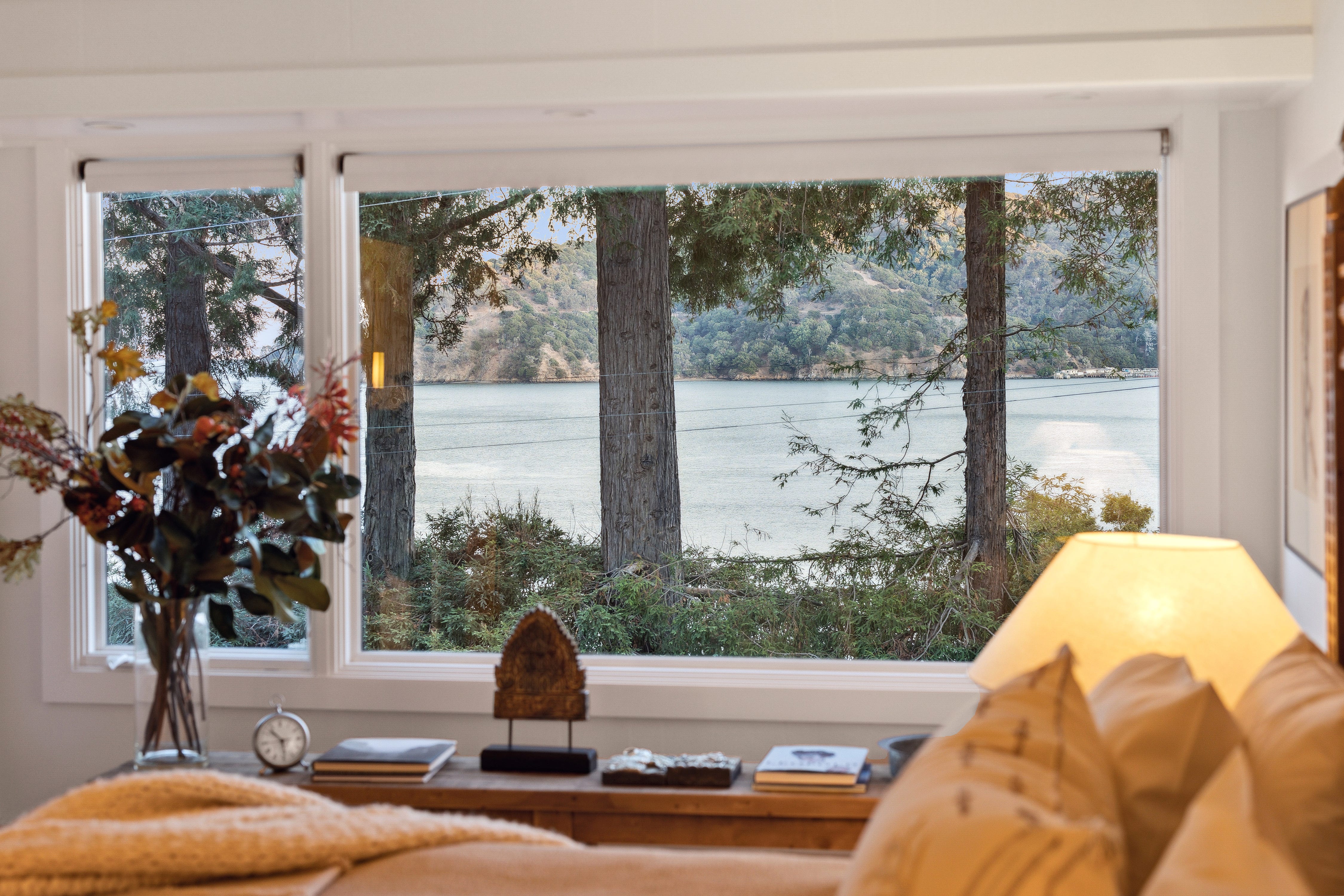 A view of the water from a bedroom.