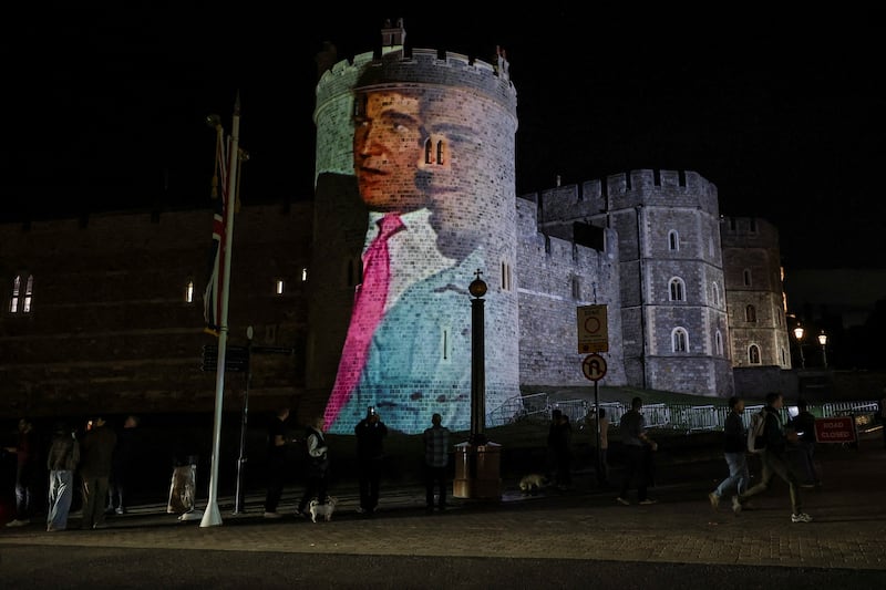 An image of U.S. President Donald Trump alongside disgraced financier Jeffrey Epstein is projected on Windsor castle, after U.S. President Donald Trump and first lady Melania Trump arrival for a state visit to the country, in Windsor, Berkshire, Britain September 16, 2025. REUTERS/Phil Noble