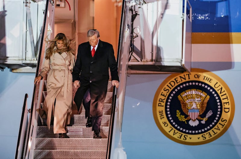U.S. President Donald Trump and first lady Melania Trump disembark Air Force One as they arrive for their state visit to Britain, at London Stansted Airport near London, Britain, September 16, 2025. REUTERS/Chris Radburn