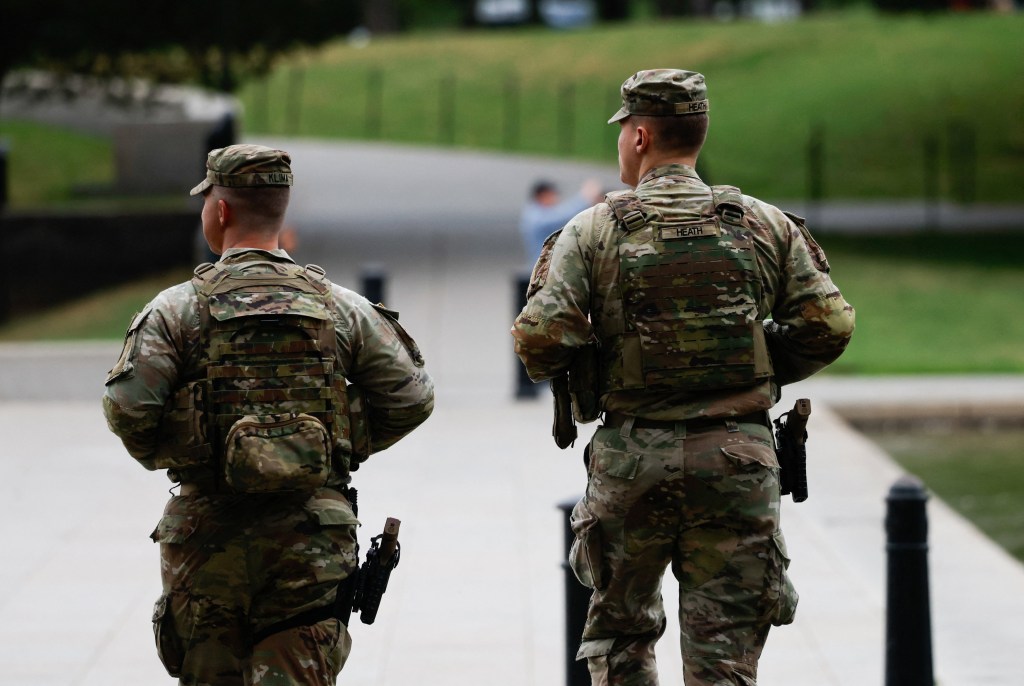 Two National Guard soldiers patrolling the National Mall in Washington, D.C.