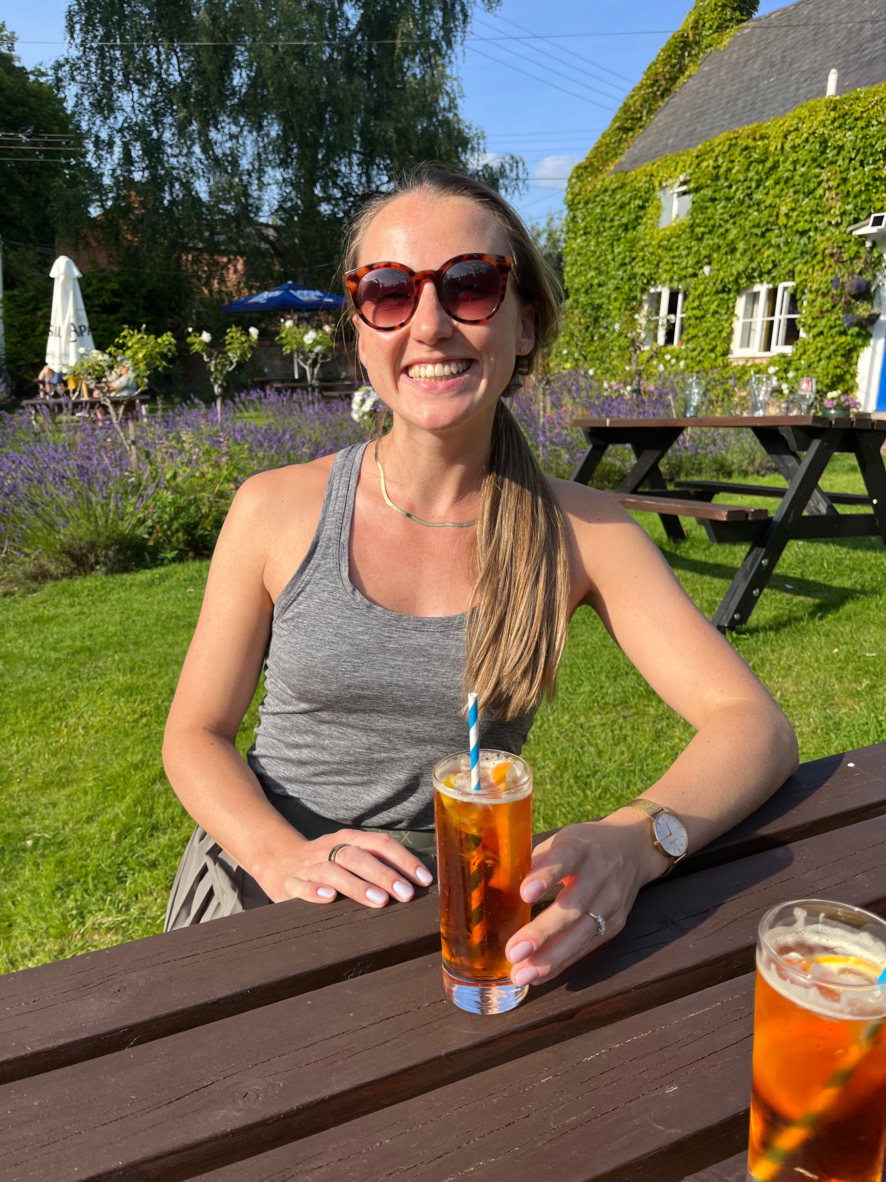 The writer drinking Pimm's at The Bell, Leicestershire.