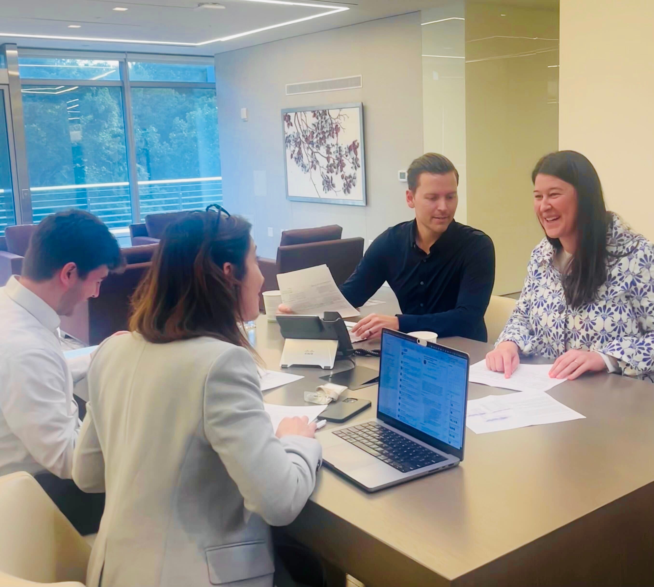 Emily Fontaine meeting with her team
