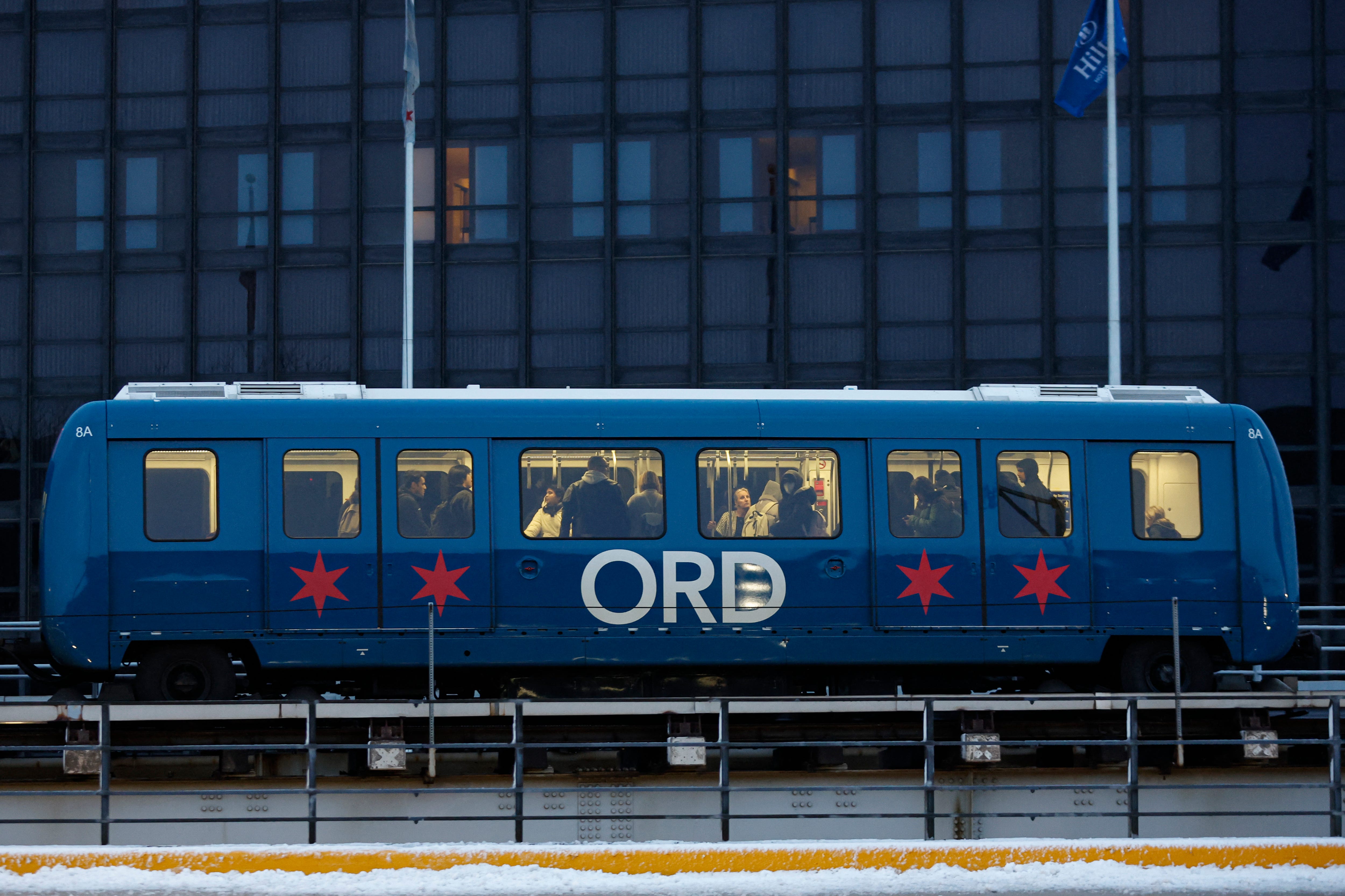 Airport Transit System train carry passengers around O'Hare International Airport in Chicago, Illinois, on December 20, 2024,