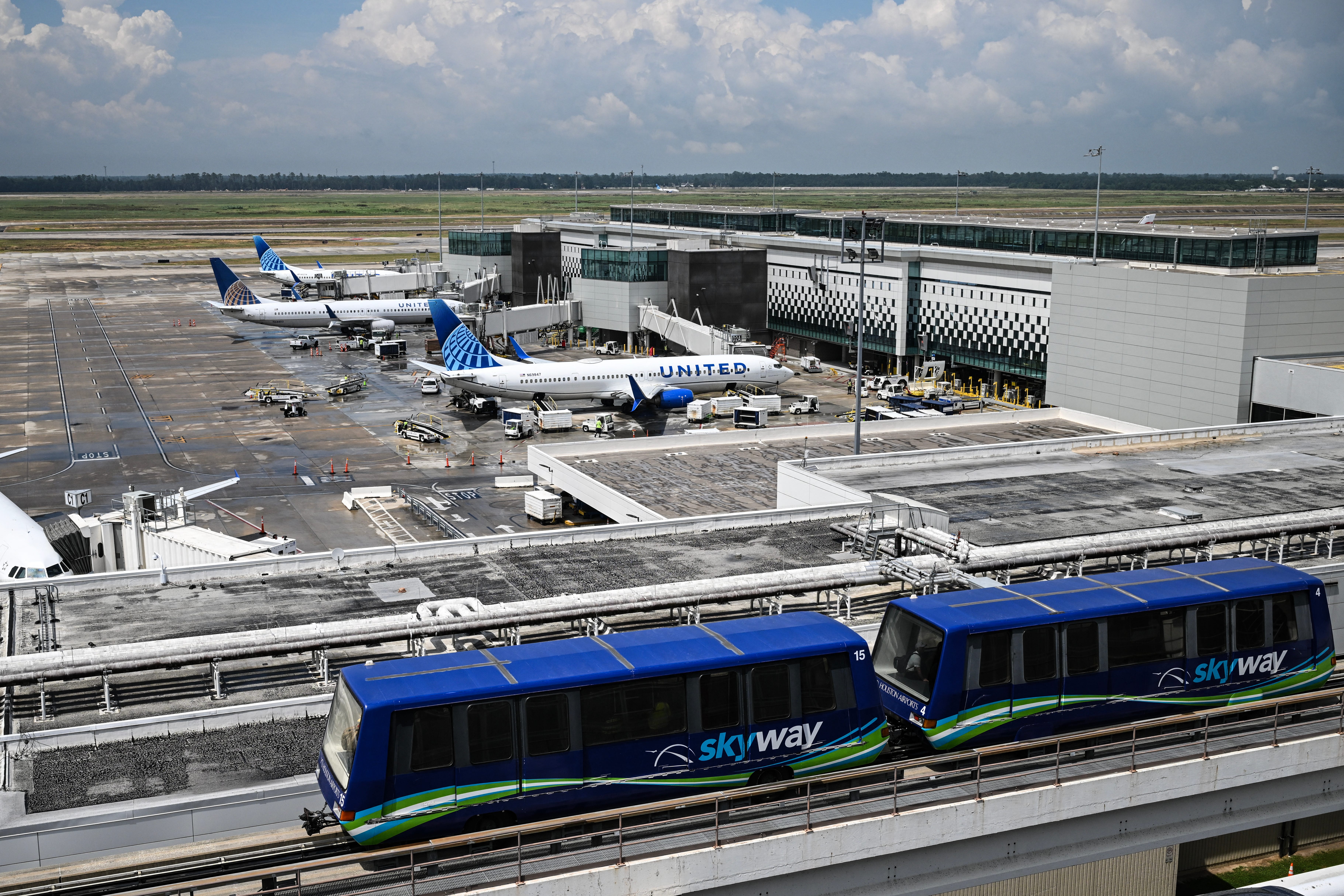 United Airlines planes are seen at George Bush Intercontinental Airport on July 25, 2025, in Houston, Texas.