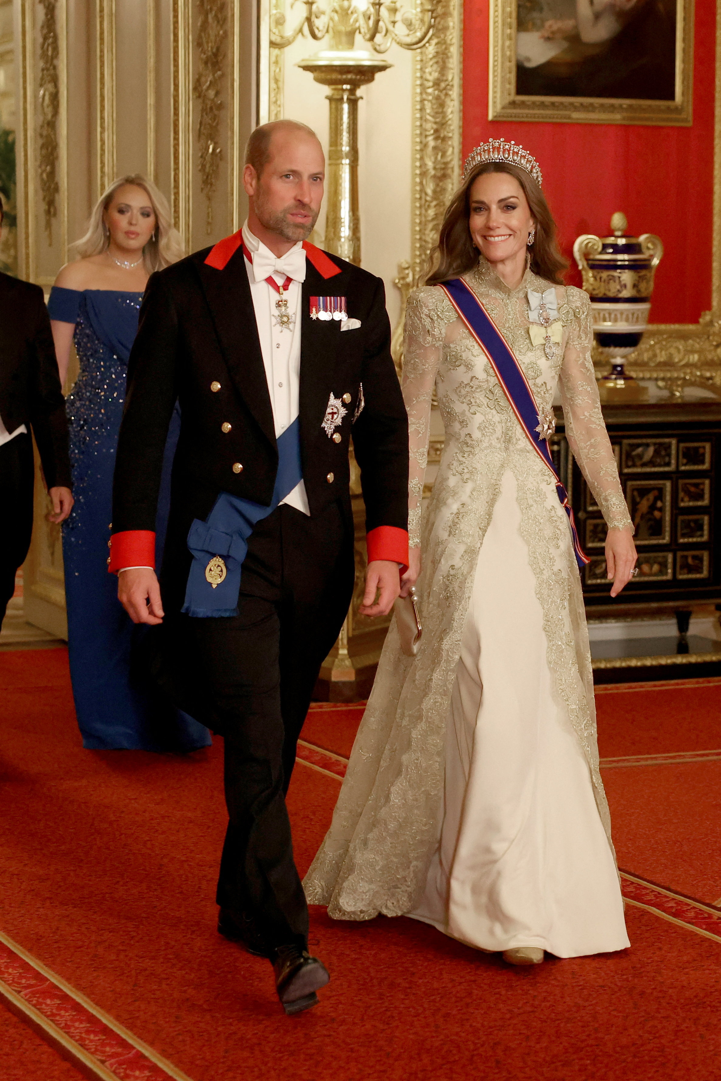 Britain's William, Prince of Wales and Catherine, Princess of Wales walk to attend the State Banquet during U.S. President Donald Trump's state visit.