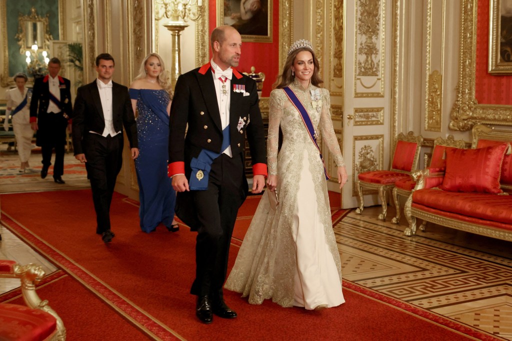 Britain's William, Prince of Wales and Catherine, Princess of Wales walk to attend the State Banquet during U.S. President Donald Trump's state visit.