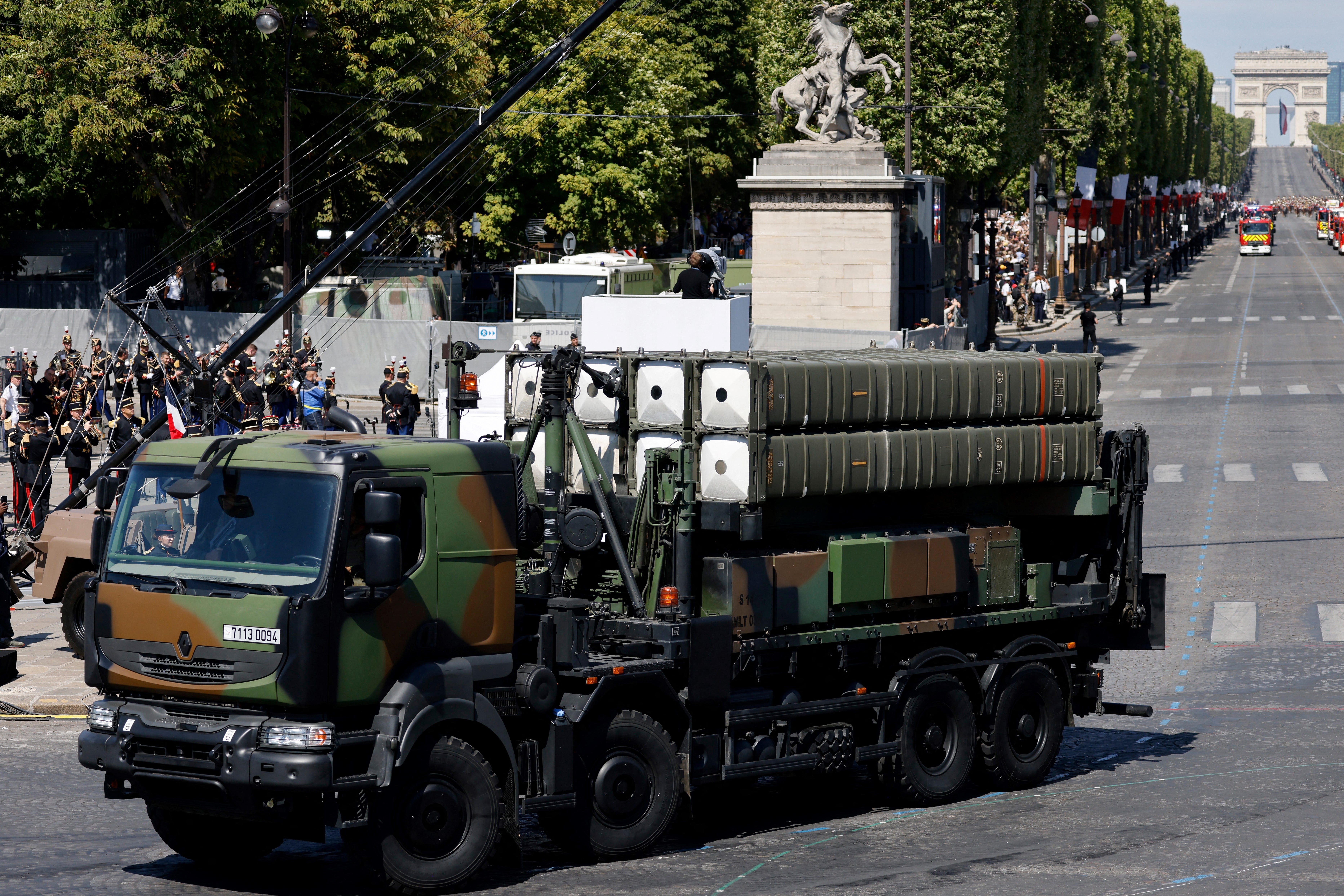 A French army truck carries SAMP/T missiles during a parade.